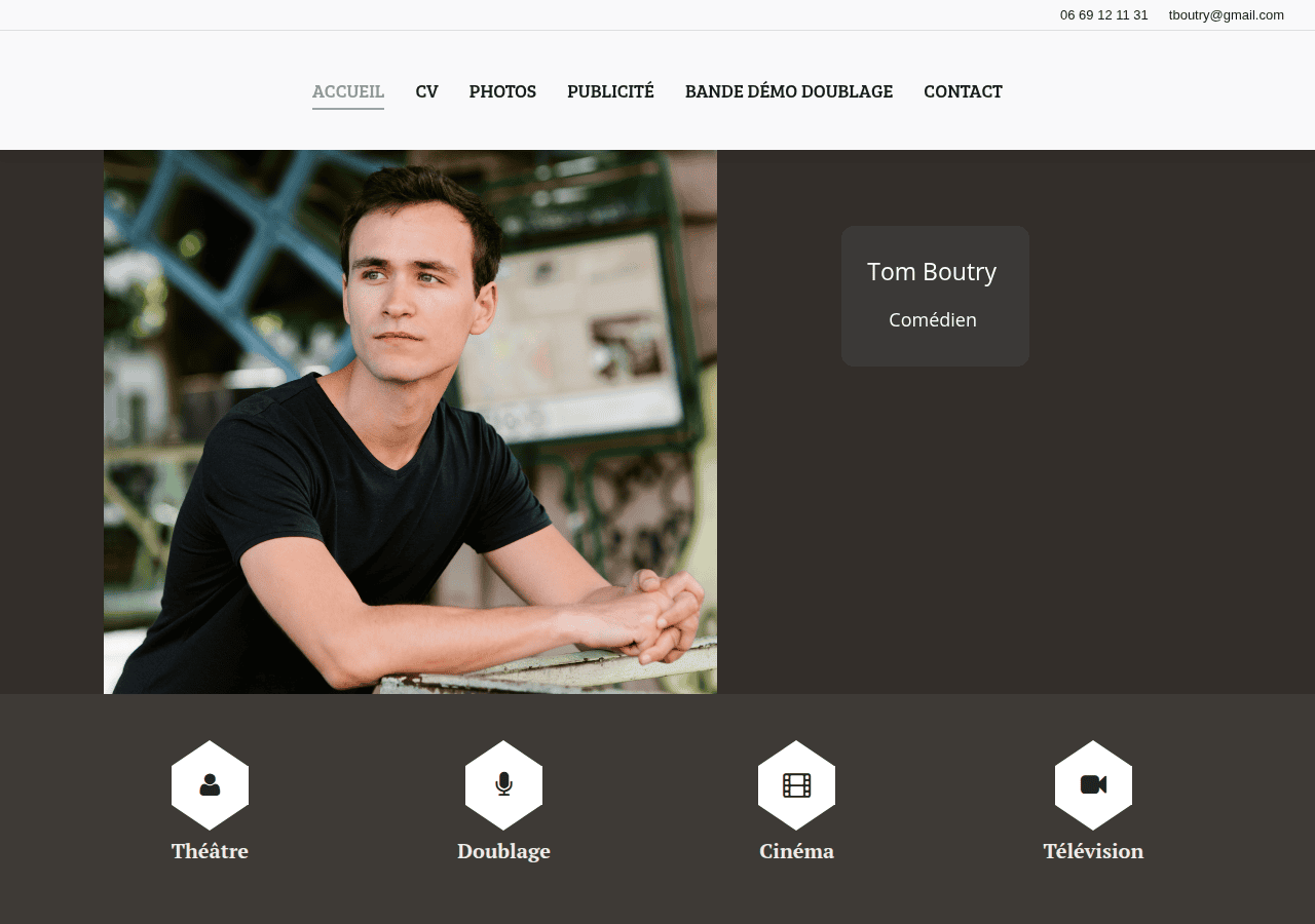 Screenshot of tomboutry.com